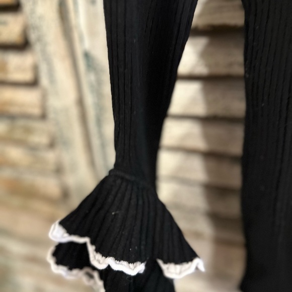 Black Ribbed V-Neck Sweater with Ruffle Cuffs - Picture 2 of 2